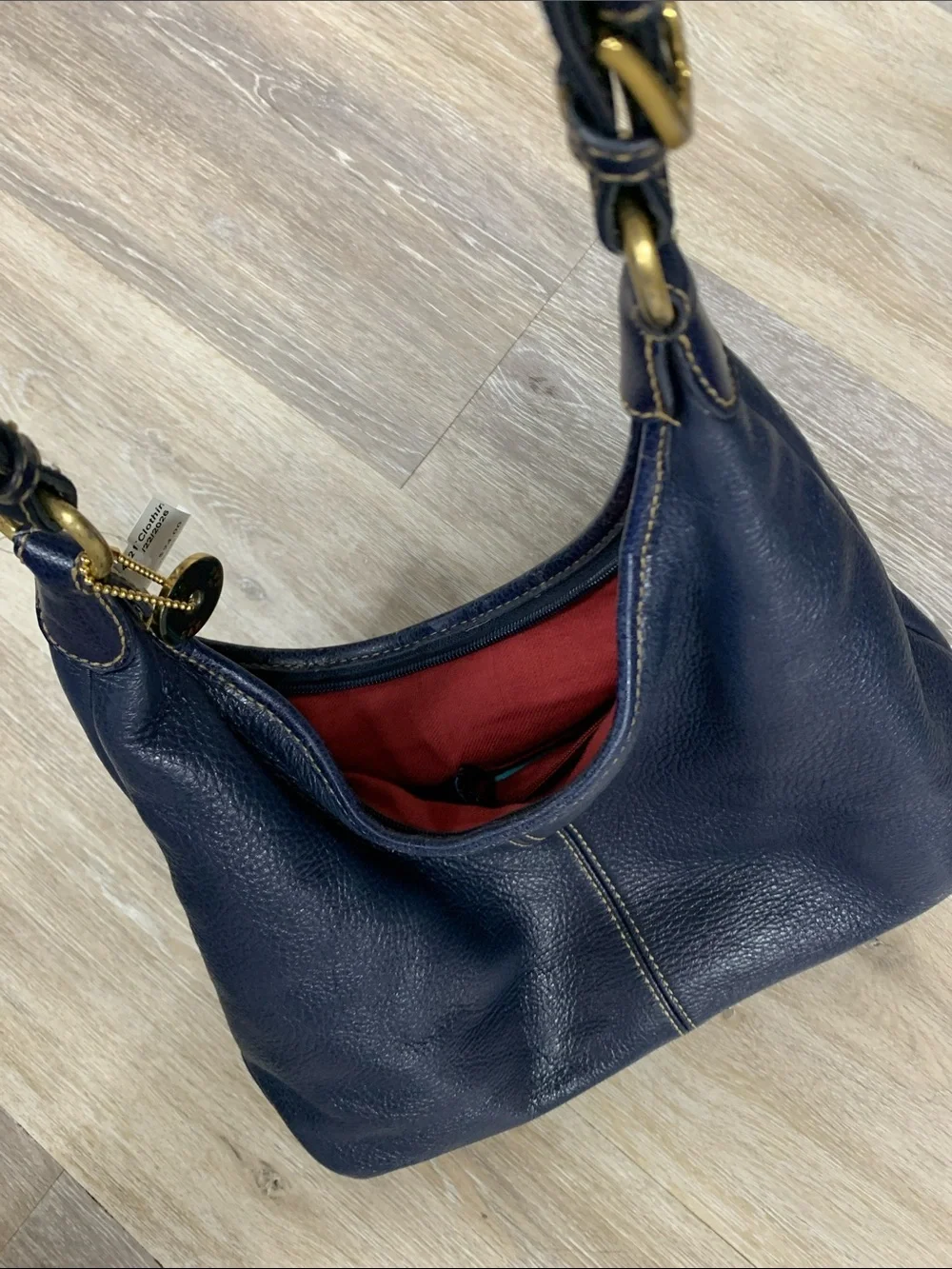 The Sak Navy Leather Shoulder Bag with Red Lining